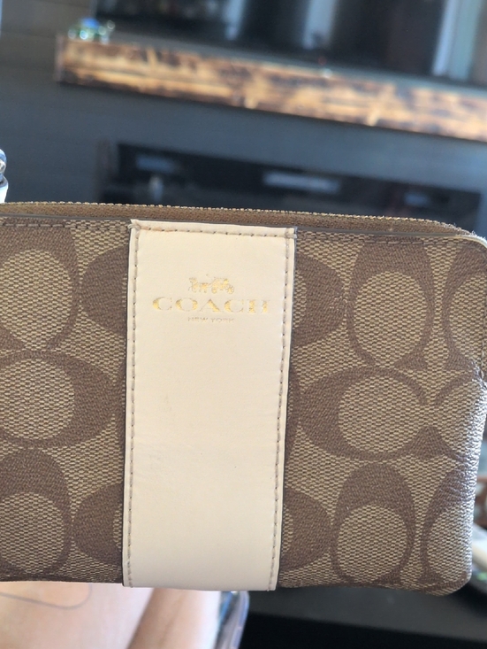Coach Handbags - Coach Tan Signature Canvas Wristlet with White Center Stripe